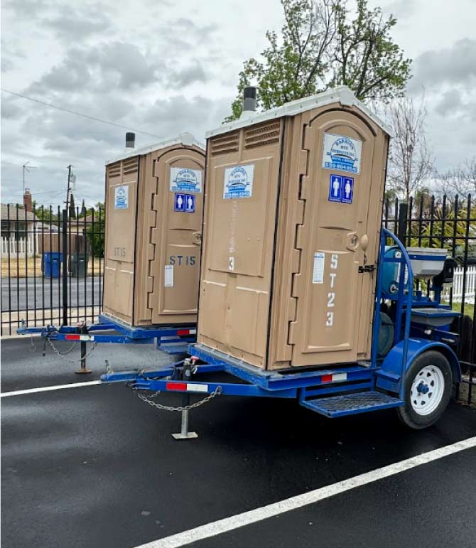 Professional delivery of single restroom trailer in fowler, ca to a large commercial construction project.