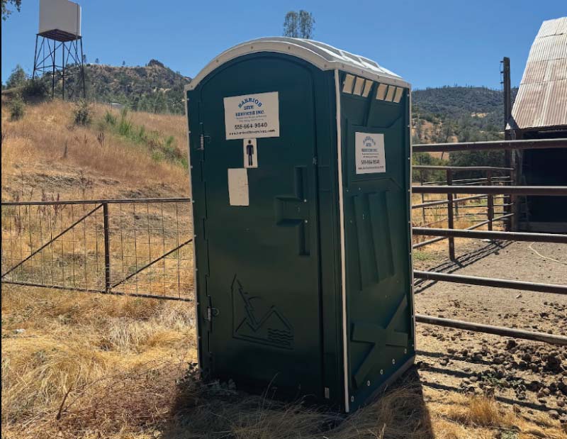 porta potty on a farm